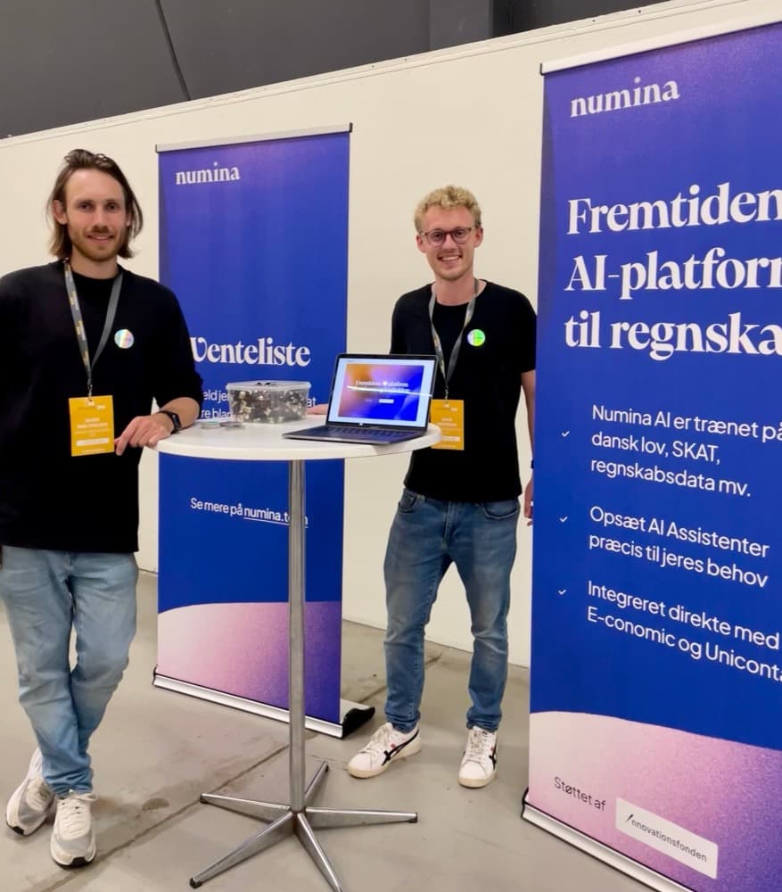 Me and my co-founder at the Numina stand